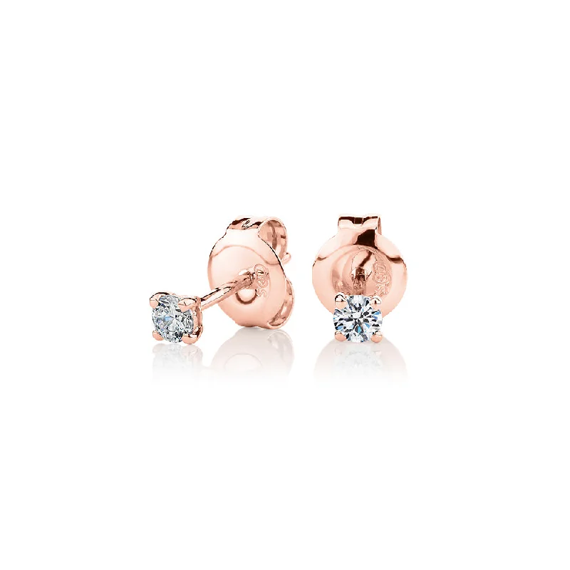 Seasonal Jewelry Sale – Upgrade Your Style Today Round Brilliant stud earrings with 0.15 carats* of diamond simulants in 10 carat rose gold Seasonal Jewelry Sale – Upgrade Your Style Today Round Brilliant stud earrings with 0.15 carats* of diamond simulants in 10 carat rose gold