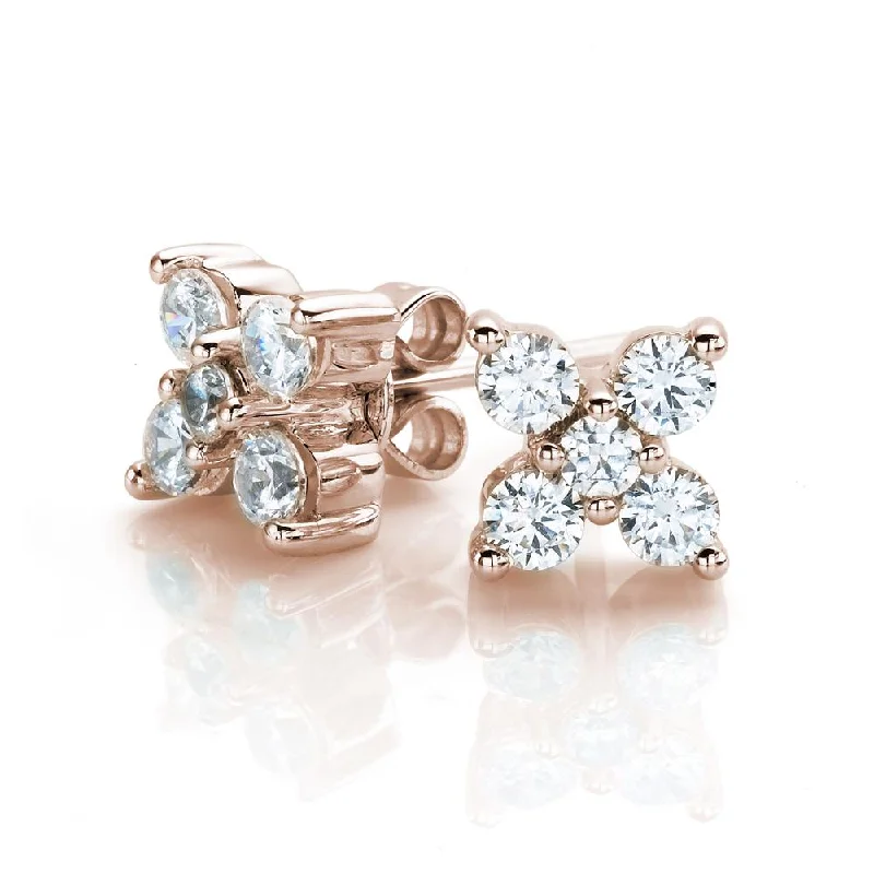Chic And Stylish Jewelry At Discounted Prices Round Brilliant stud earrings with 0.54 carats* of diamond simulants in 10 carat rose gold